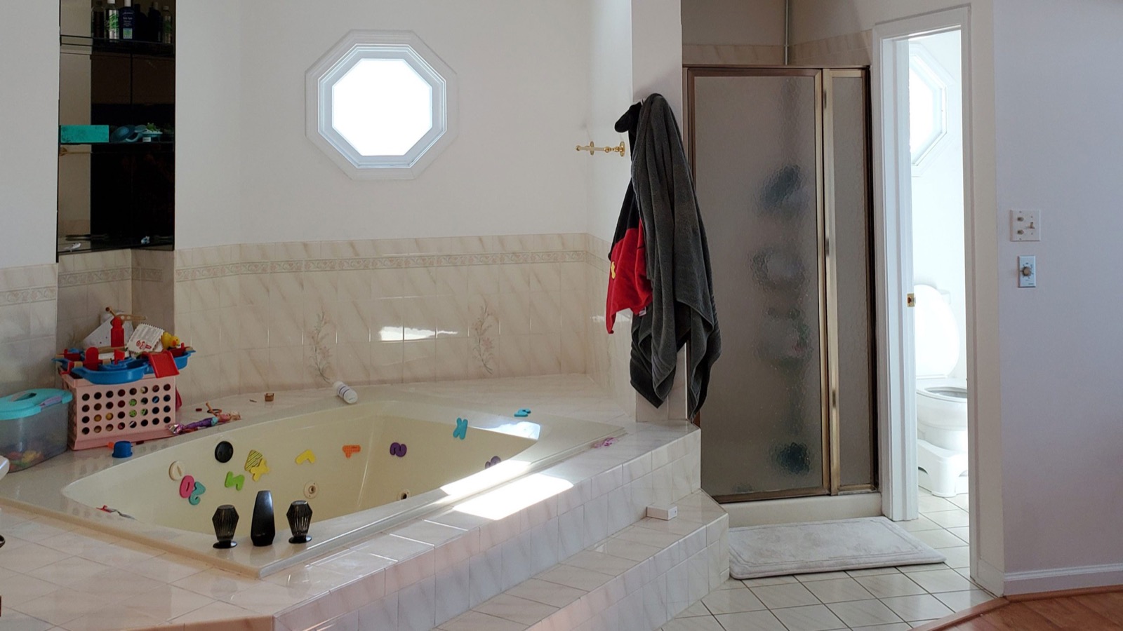 Before: Dated master bath